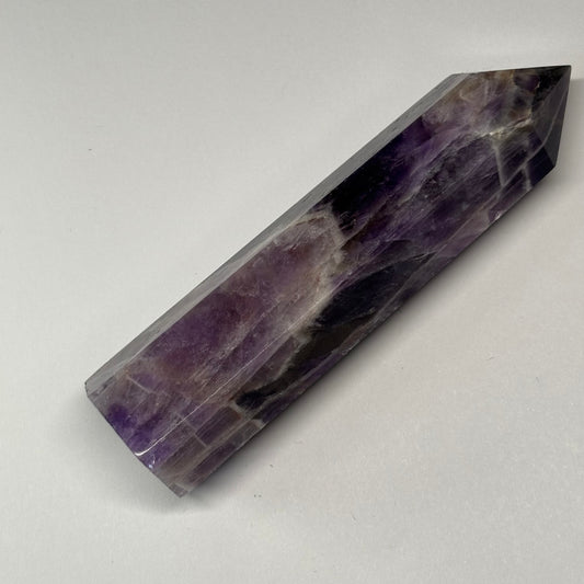 dream amethyst tower, chevron amethyst, healing crystal, witch altar crystal, pagan tools, amethyst point, spiritual crystal, crown chakra stone, third eye chakra, crystal for intuition, crystal for healing, metaphysical crystal, witchcraft tools, reiki crystal, energy cleansing, altar decor, sacred space crystal, spiritual shop, new age gifts