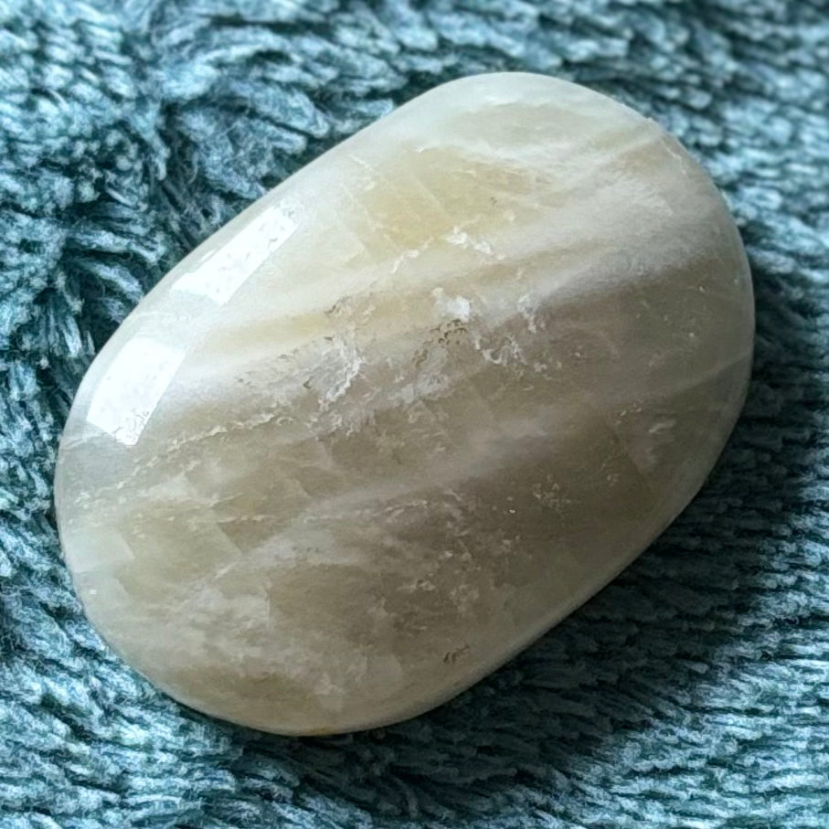 Moonstone palm stone