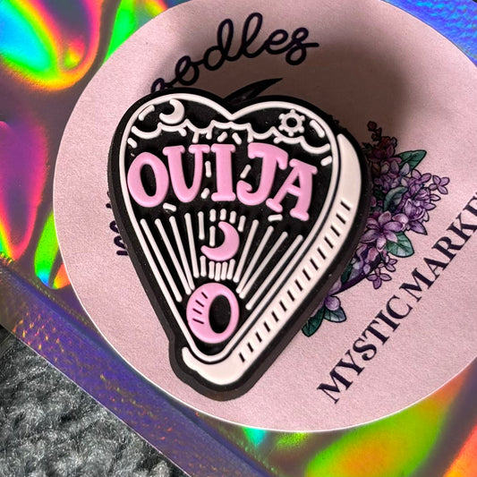 Ouija planchette croc charm